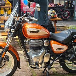 The Sundowner Orange gets an orange fuel tank with a pin striping.