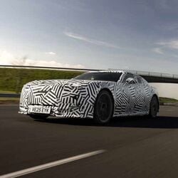 The upcoming electric GT, inspired by the Jaguar Type 00 Concept, brings a minimalist layout, a curved display, and a distinctive neo-retro steering wheel