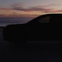 Lexus has teased a new electric three-row SUV based on the Toyota Highlander EV, with an official unveiling scheduled for May 6