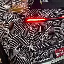 The latest series of spyshots has revealed an updated bumper element and a large touchscreen infotainment system of the Tata Sierra EV. (Image: Reddit/CarsIndia)