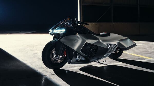 BMW Motorrad has unveiled the Vision K18 concept motorcycle with a 1,800 cc inline-six engine and aircraft-inspired styling.