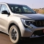 For someone seeking a three-row SUV over an MPV, the priorities are commanding road presence, better ground clearance, and more dynamic styling.