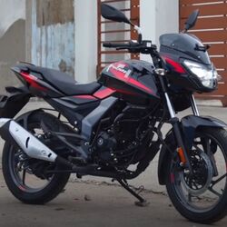 The updated Bajaj Pulsar 150 is arriving at select dealerships, featuring design changes, a new LED headlight, and Bluetooth connectivity. The launch is expected to happen soon. 