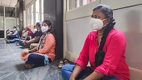 New Delhi: AIIMS nurses during a sit-in protest demanding improvement in working conditions, during the ongoing COVID-19 nationwide lockdown, in New Delhi, Thursday, June 4, 2020. Their demands amongst others also include implementation of a uniform four-hour shift with personal protective equipment in COVID-19 areas of the hospital. (PTI Photo)(PTI04-06-2020_000249B) (PTI) New Delhi: AIIMS nurses during a sit-in protest demanding improvement in working conditions, during the ongoing COVID-19 nationwide lockdown, in New Delhi, Thursday, June 4, 2020. Their demands amongst others also include implementation of a uniform four-hour shift with personal protective equipment in COVID-19 areas of the hospital. (PTI Photo)(PTI04-06-2020_000249B) (PTI)