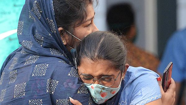 Relatives mourn for the victim who died due to coronavirus disease, at Medical College and Hospital in Kolkata on Tuesday. (ANI Photo) Relatives mourn for the victim who died due to coronavirus disease, at Medical College and Hospital in Kolkata on Tuesday. (ANI Photo)