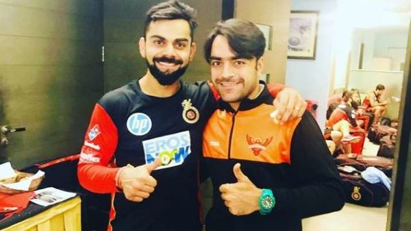 ভারতের অধিনায়ক বিরাট কোহলি ও আফগানিস্তানের সহ অধিনায়ক রশিদ খান (ছবি: গুগল) ভারতের অধিনায়ক বিরাট কোহলি ও আফগানিস্তানের সহ অধিনায়ক রশিদ খান (ছবি: গুগল)
