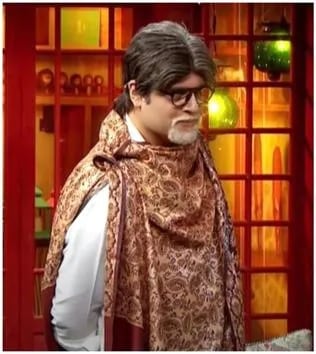 ‘দ্য কপিল শর্মা শো’-তে অমিতাভ বচ্চনের মতো সেজেগুজে হাজির হয়েছিলেন ক্রুষ্ণা অভিষেক। (ছবি সৌজন্যে -হিন্দুস্তান টাইমস) ‘দ্য কপিল শর্মা শো’-তে অমিতাভ বচ্চনের মতো সেজেগুজে হাজির হয়েছিলেন ক্রুষ্ণা অভিষেক। (ছবি সৌজন্যে -হিন্দুস্তান টাইমস)