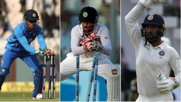 সাম্প্রতিক সময়ের তিন ভারতীয় কিপার ধোনি, ঋদ্ধিমান ও দীনেশ কার্তিক। ছবি- গেটি/ পিটিআই। সাম্প্রতিক সময়ের তিন ভারতীয় কিপার ধোনি, ঋদ্ধিমান ও দীনেশ কার্তিক। ছবি- গেটি/ পিটিআই।
