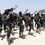 FILE - Hundreds of newly trained al-Shabab fighters perform military exercises in the Lafofe area some 18 km south of Mogadishu, in Somalia on Feb. 17, 2011. Facebook has failed to catch Islamic State group and al-Shabab extremist content in posts aimed at East Africa as the region remains under threat from violent attacks and Kenya prepares to vote in a closely contested national election, according to a new study released Wednesday, June 15, 2022. (AP Photo/Farah Abdi Warsameh, File) (AP)
