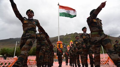 Drass, India - July 25, 2022: Soldiers march at Kargil War Memorial in memory of the soldiers who laid down their lives during the 1999 Kargil War, in Drass, Ladakh, India, on July 25, 2022. (Photo by Waseem Andrabi / Hindustan Times)