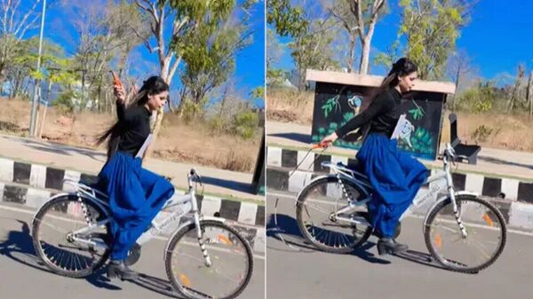 Woman skipping while cycling: সাইকেল চালাতে-চালাতে স্কিপিং তরুণীর, ভাইরাল বুকে ভয় ধরানো স্টান্টের ভিডিয়ো