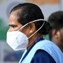 A woman wears a face mask as she walks into a government hospital, since a rise in Covid-19 coronavirus cases, in Chennai on�April�1, 2023. (Photo by R.Satish Babu / AFP) (AFP) A woman wears a face mask as she walks into a government hospital, since a rise in Covid-19 coronavirus cases, in Chennai on�April�1, 2023. (Photo by R.Satish Babu / AFP) (AFP)