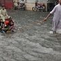 <p>পাকিস্তানে ভয়াবহ বর্ষণ। (AP Photo/K.M. Chaudary)</p> (AP)