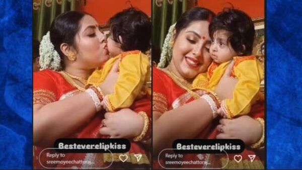 মেয়েকে আদরের চুমু শ্রীময়ীর