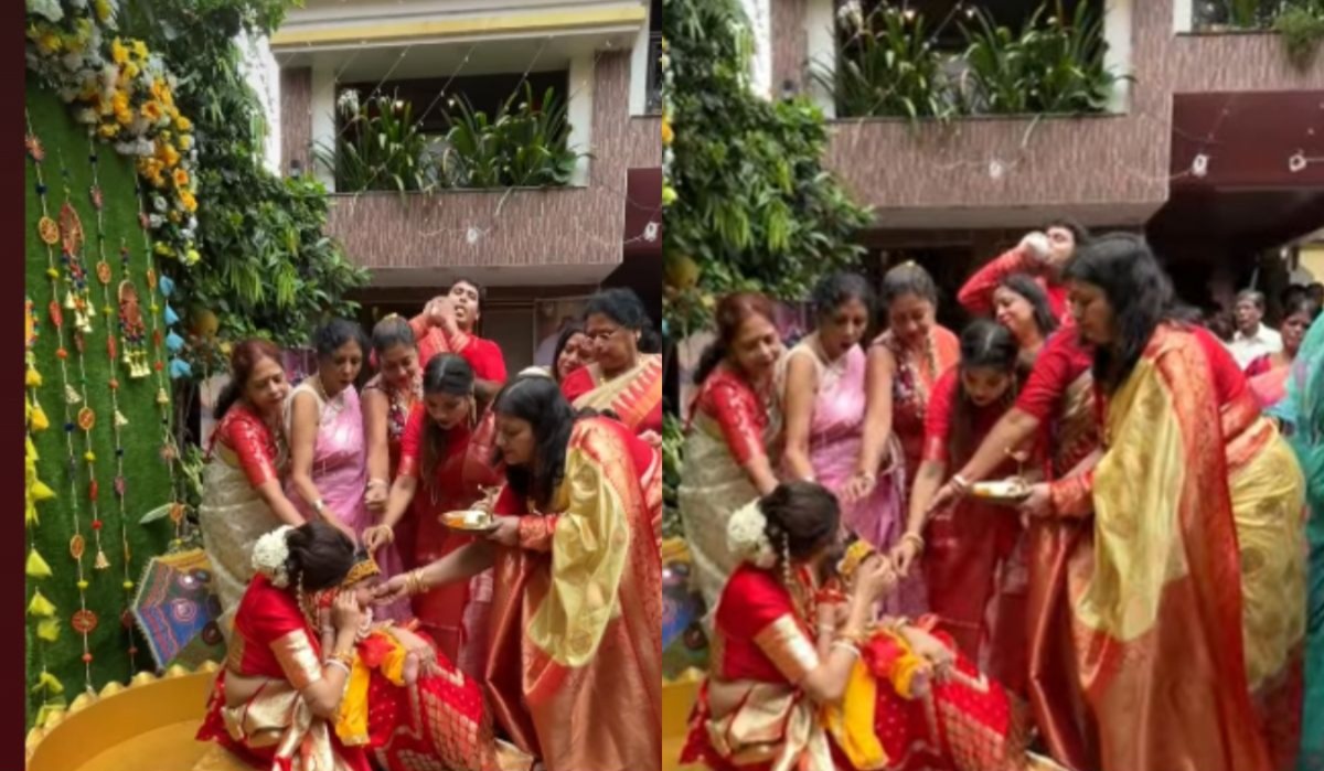 ছেলের স্নানের সময় শাঁখ বাজালেন বাবা সায়নদীপ ছেলের স্নানের সময় শাঁখ বাজালেন বাবা সায়নদীপ