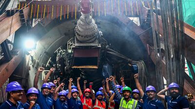 টানেল বোরিং মেশিনের কাজ শুরুর পরে উল্লাস । (PTI Photo) (PTI)