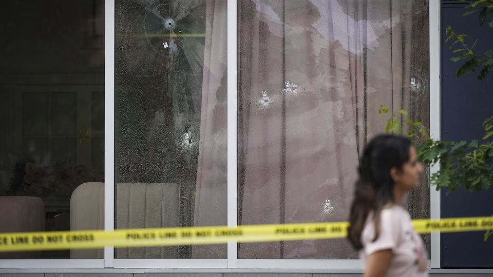Bullet holes are seen in the windows of a cafe, in Surrey, British Columbia, Thursday, July 10, 2025, as Surrey Police investigate shots that were fired at Kap's Cafe, which is linked to comic and television host Kapil Sharma, who posted a video of the new establishment on Instagram this week. AP/PTI(AP07_11_2025_000006B)(AP)