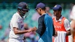 India's Cheteshwar Pujara, left, has treatment to a finger injury during play on day three of the third cricket test between India and Australia at the Sydney Cricket Ground, Sydney, Australia, Saturday, Jan. 9, 2021. India's Cheteshwar Pujara, left, has treatment to a finger injury during play on day three of the third cricket test between India and Australia at the Sydney Cricket Ground, Sydney, Australia, Saturday, Jan. 9, 2021.