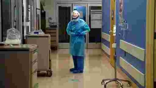 A nurse puts on her PPE in a Covid-19 unit at a hospital in California.(AP File Photo ) A nurse puts on her PPE in a Covid-19 unit at a hospital in California.(AP File Photo )