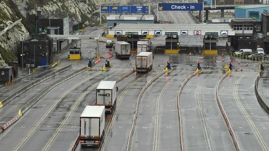 Lorries prepare to embark on a ferry at the Port of Dover, southeast England, on January 4, following Britain's departure from the European Union.(Glyn Kirk / AFP)