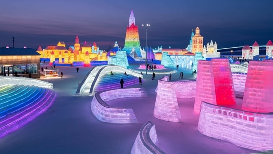 People look at ice sculptures at the Harbin Ice and Snow Festival in Harbin, in northeastern China's Heilongjiang province on January 5.(AFP)
