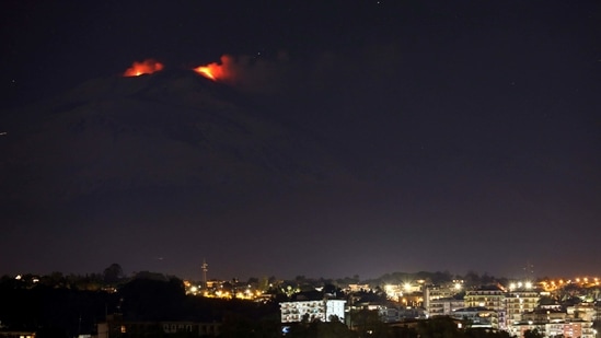 Eruptions from Mount Etna light up the sky during the night, seen from Catania, Italy on January 4.(Antonio Parrinello / REUTERS)