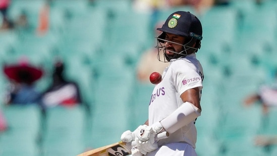 Sydney: India's Cheteshwar Pujara reacts as he avoids a ball while batting during play on day three of the third cricket test between India and Australia at the Sydney Cricket Ground, Sydney, Australia, Saturday, Jan. 9, 2021. AP/PTI(AP01_09_2021_000007B) (AP) Sydney: India's Cheteshwar Pujara reacts as he avoids a ball while batting during play on day three of the third cricket test between India and Australia at the Sydney Cricket Ground, Sydney, Australia, Saturday, Jan. 9, 2021. AP/PTI(AP01_09_2021_000007B) (AP)