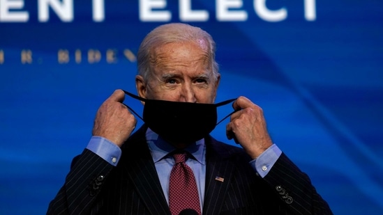 Joe Biden also called for raising the minimum wage to $15, a campaign promise, and for sending out $2,000 in direct cash payments. (AP) Joe Biden also called for raising the minimum wage to $15, a campaign promise, and for sending out $2,000 in direct cash payments. (AP)