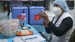 A health worker takes part in a dry run or a mock drill for Covid-19 vaccine delivery at a model Covid-19 vaccination centre at Ansari Road in New Delhi.(HT photo)