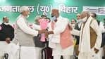 Patna: Bihar Chief Minister Nitish Kumar and JD(U) National President RCP Singh (R) greet newly elected party state President Umesh Kushwaha (C) during the second day of party state council meeting, in Patna.(PTI) Patna: Bihar Chief Minister Nitish Kumar and JD(U) National President RCP Singh (R) greet newly elected party state President Umesh Kushwaha (C) during the second day of party state council meeting, in Patna.(PTI)