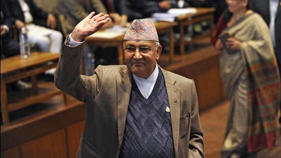 In this file photo taken on October 28, 2015, Nepal's Prime Minister KP Sharma Oli waves after casting his vote in an election for Nepal's new president in Kathmandu. (AFP)