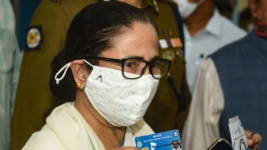 Chief Minister Mamata Banerjee after collecting her Swasthya Sathi card from an outreach camp Duare Sarkar, in Kolkata.(PTI)