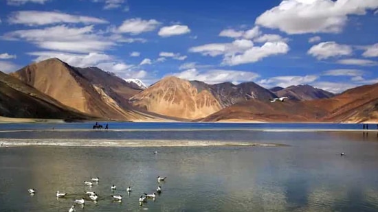 The PLA is sitting on green top of finger four feature on Pangong Tso.(AP photo)