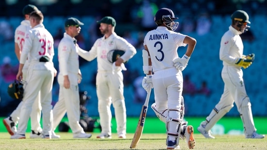 India's Ajinkya Rahane rests on his bat at the close of play on day four of the third cricket test between India and Australia at the Sydney Cricket Ground.(AP)