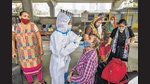 Health workers take Covid-19 tests of people at Dadar on Monday. (Pratik Chorge/HT Photo) Health workers take Covid-19 tests of people at Dadar on Monday. (Pratik Chorge/HT Photo)