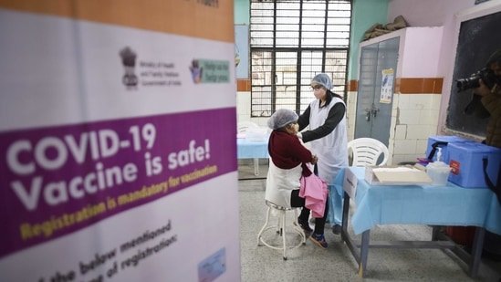 A medic and a volunteer take part in a dry run for Covid-19 vaccination at a municipal school in New Delhi on January 8. The country's current tally of coronavirus cases is at 10,466,595, according to the Union health and family welfare ministry on January 11.(Vipin Kumar / HT Phoro)