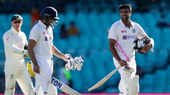 Not out batsman India's Ravichandran Ashwin, right, and Hanuma Vihari walk from the field following play on the final day of the third cricket test between India and Australia at the Sydney Cricket Ground, Sydney, Australia, Monday, Jan. 11, 2021. The test ended in a draw and the series is at 1-1 all with one test to play. (AP Photo/Rick Rycroft)(AP)