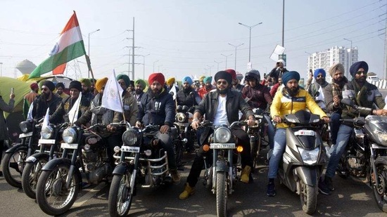 Bikers taking part in a bike rally in support of farmers at Ghazipur border on Sunday. (HT photo)