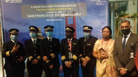 The all-women crew of AI 176 at Bengaluru's Kempegowda International Airport (twitter.com/HardeepSPuri)