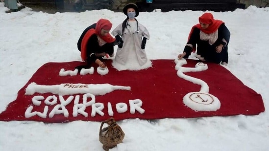 The snow art has models of a lady doctor, a syringe loaded with Covid vaccine, a stethoscope and the acronym of World Health Organisation (WHO).(Twitter) The snow art has models of a lady doctor, a syringe loaded with Covid vaccine, a stethoscope and the acronym of World Health Organisation (WHO).(Twitter)