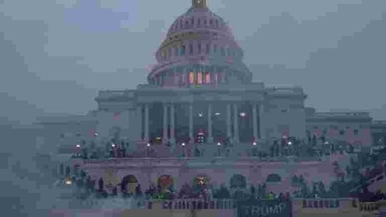 Police officers stand guard as supporters of US President Donald Trump gather in front of the US Capitol Building in Washington. (REUTERS) Police officers stand guard as supporters of US President Donald Trump gather in front of the US Capitol Building in Washington. (REUTERS)