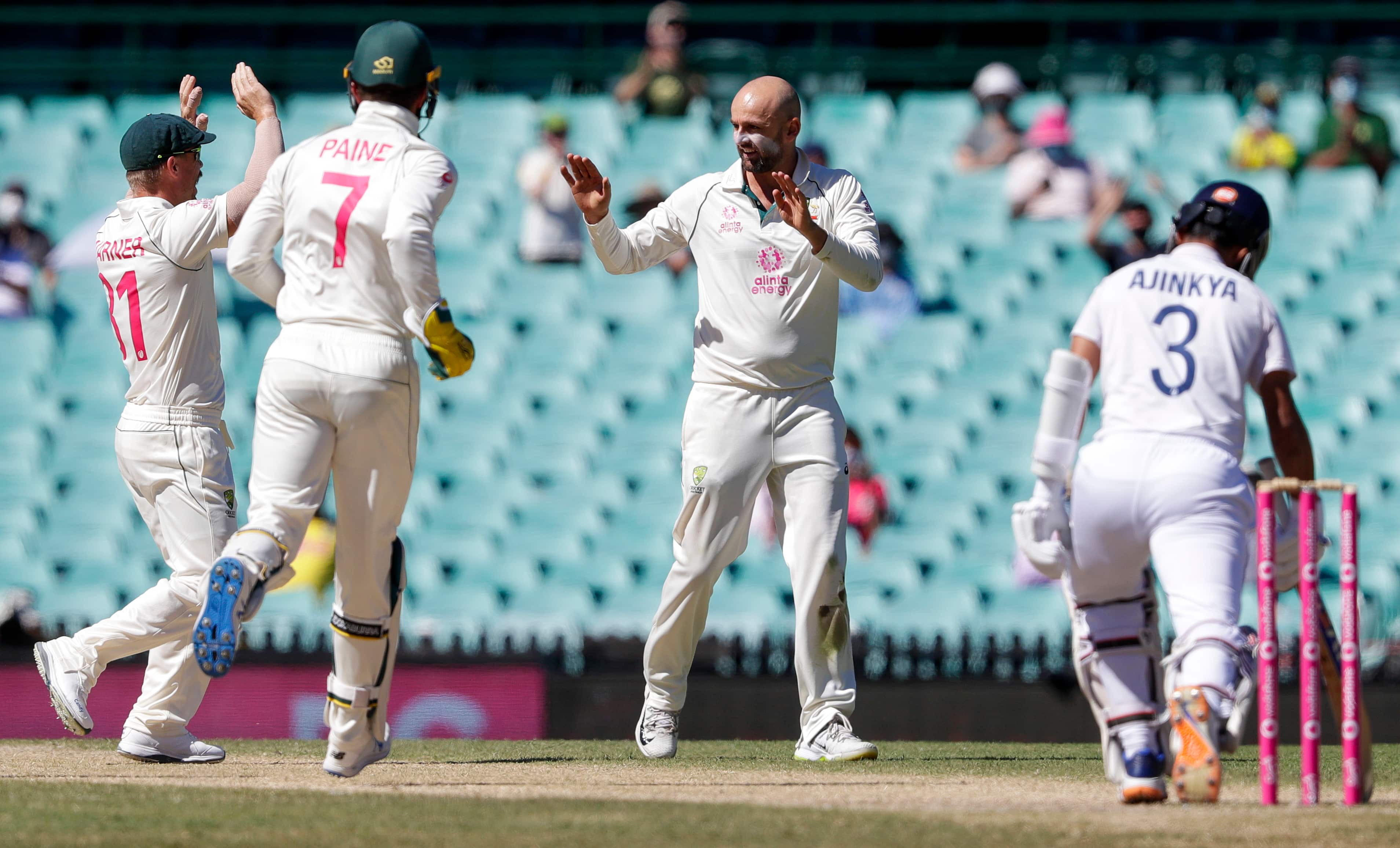 Australia's Nathan Lyon, second right, is congratulated by teammates after dismissing India's Ajinkya Rahane, right, during play on the final day of the third cricket test between India and Australia at the Sydney Cricket Ground, Sydney, Australia, Monday, Jan. 11, 2021. Australia's Nathan Lyon, second right, is congratulated by teammates after dismissing India's Ajinkya Rahane, right, during play on the final day of the third cricket test between India and Australia at the Sydney Cricket Ground, Sydney, Australia, Monday, Jan. 11, 2021.