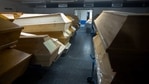 The caskets are stacked three high in the Meissen crematorium's somber memorial hall, piled up in empty offices and stored in hallways. Many are sealed with plastic wrapping, others are labeled “infection risk,” “urgent” or simply “COVID.”(AP) The caskets are stacked three high in the Meissen crematorium's somber memorial hall, piled up in empty offices and stored in hallways. Many are sealed with plastic wrapping, others are labeled “infection risk,” “urgent” or simply “COVID.”(AP)