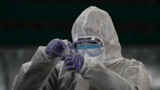 A doctor prepares coronavirus testing for residents. (AP) A doctor prepares coronavirus testing for residents. (AP)