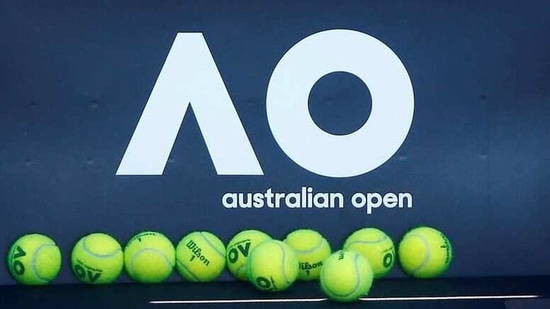 FILE PHOTO: Tennis - Australian Open - Melbourne, Australia, January 14, 2018. Tennis balls are pictured in front of the Australian Open logo before the tennis tournament. REUTERS/Thomas Peter/File Photo(REUTERS)