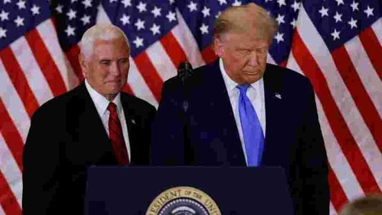 US President Donald Trump and Vice-President Mike Pence stand while making remarks about early results from the 2020 US presidential election in the East Room of the White House in Washington, on November 4, 2020. (Reuters file) US President Donald Trump and Vice-President Mike Pence stand while making remarks about early results from the 2020 US presidential election in the East Room of the White House in Washington, on November 4, 2020. (Reuters file)