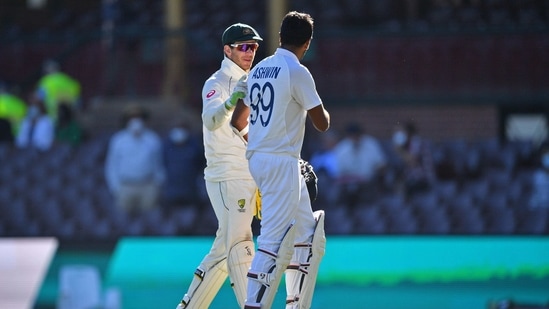 Australia's captain Tim Paine (L) greets India's Ravichandran Ashwin at the end of the third cricket Test match.(AFP) Australia's captain Tim Paine (L) greets India's Ravichandran Ashwin at the end of the third cricket Test match.(AFP)