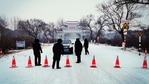 Security personnel direct a commuter in Ang'angxi district as the province prepares to declare an "emergency state" asking residents not to leave unless necessary in Qiqihar, Heilongjiang province, China on January 12. China recorded its biggest daily jump in Covid-19 cases in more than five months on January 13, stepping up containment measures that have seen four cities put under lockdown. Security personnel direct a commuter in Ang'angxi district as the province prepares to declare an "emergency state" asking residents not to leave unless necessary in Qiqihar, Heilongjiang province, China on January 12. China recorded its biggest daily jump in Covid-19 cases in more than five months on January 13, stepping up containment measures that have seen four cities put under lockdown.
