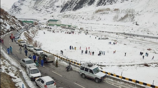 Tourists visit snow-covered fields near Atal Tunnel in Sissu, Lahaul-Spiti late in 2020. (File photo)