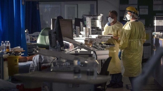 Nurses work with patients inside the Intensive Care Unit at St George's Hospital in London, (AP) Nurses work with patients inside the Intensive Care Unit at St George's Hospital in London, (AP)